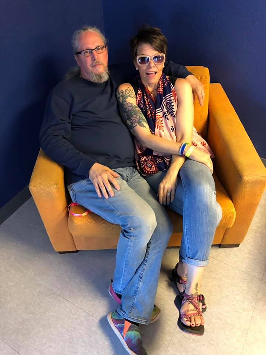 Steve and Fálki in an orange chair